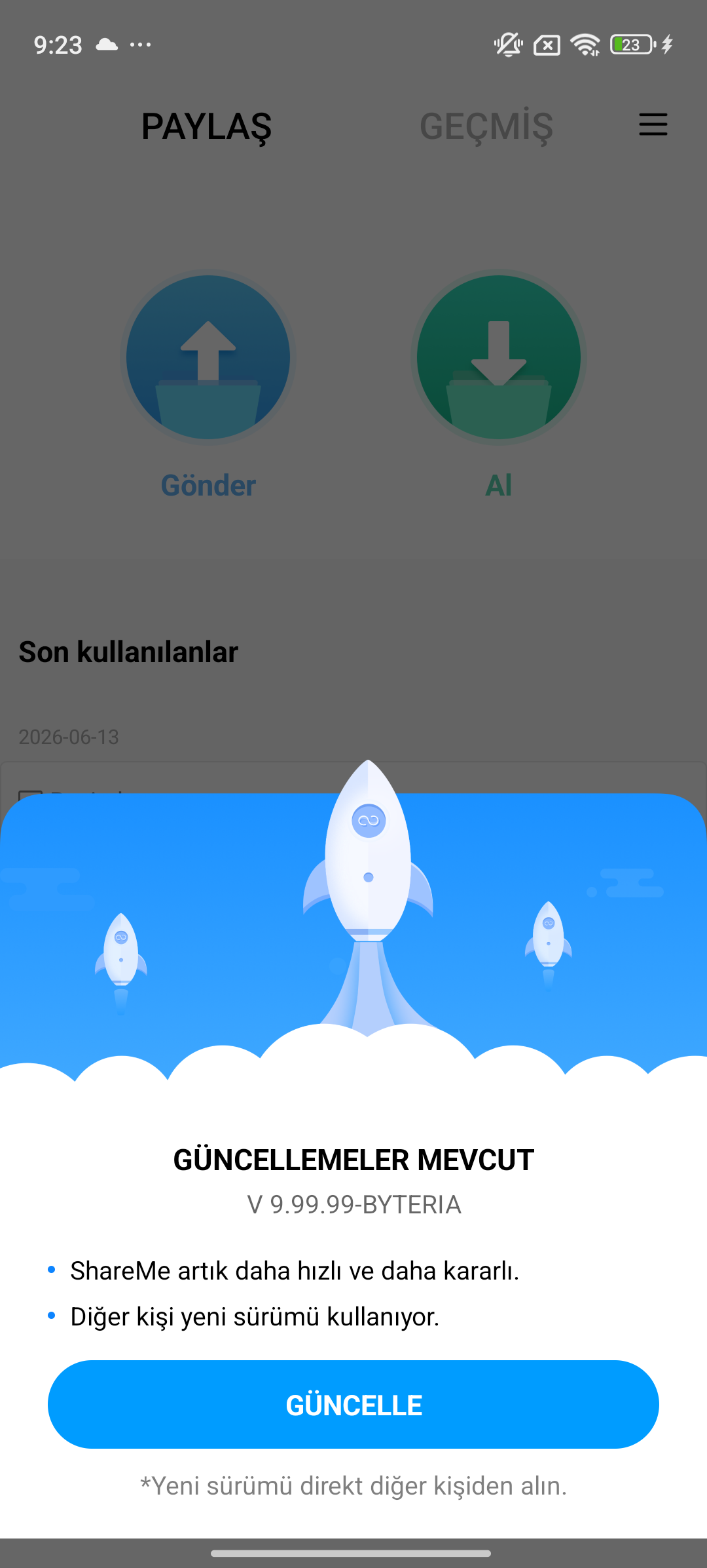 ShareMe showing “GÜNCELLEMELER MEVCUT V 9.99.99-BYTERIA” — a fake update dialog triggered by a debug-signed APK dropped silently via silence:true. No signature was verified at any point in ShareMe’s own code.
