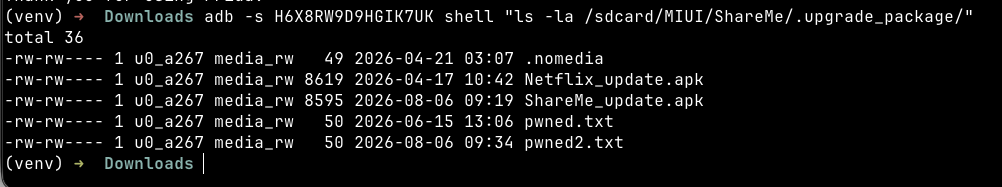adb shell confirming pwned2.txt was delivered to .upgrade_package/ — timestamp 09:34, size 50 bytes.